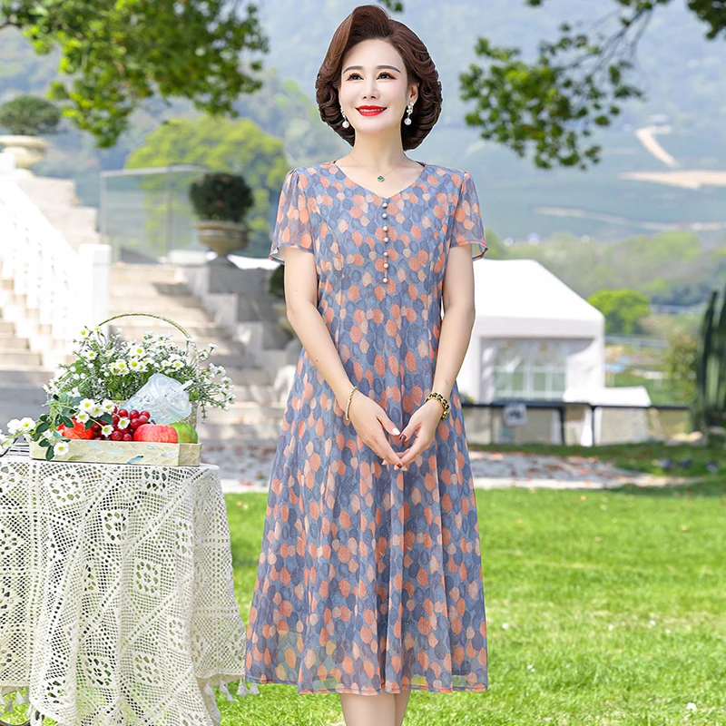 夏季新款妈妈时尚洋气清新中长款女裙中老年女气质优雅印花连衣裙