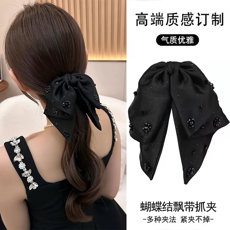 黑色蝴蝶结抓夹2024年新款鲨鱼夹丸子头发夹马尾发卡气质半扎发饰