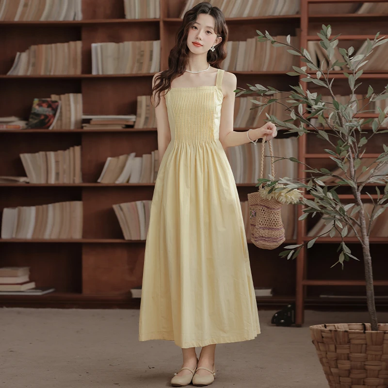 简温2025夏季新款方领风琴褶吊带连衣裙女收腰显瘦露背无袖长裙