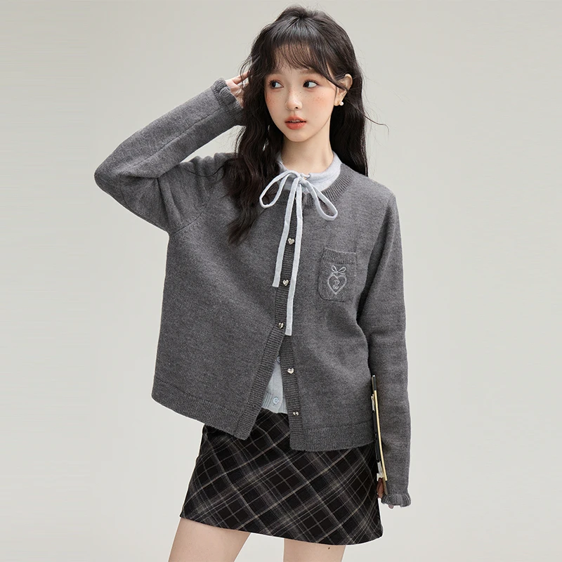 简温2025春秋新款假两件复古圆领针织开衫女温柔气质系带上衣潮