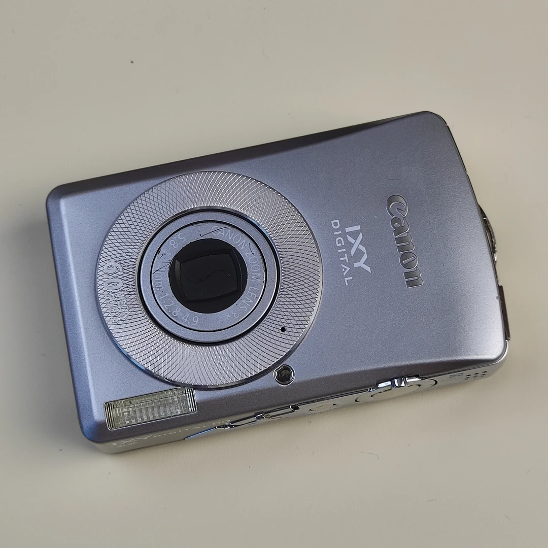 9新 Canon/佳能 IXY80（65）银色600万像素3倍变焦ccd数码相机