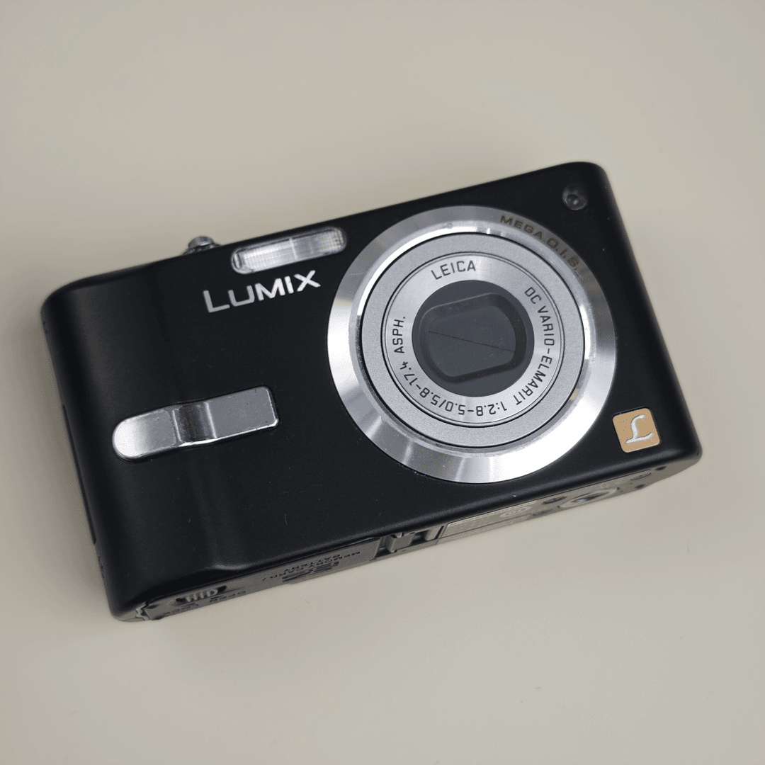 95新 Panasonic/松下 fx12黑色720万像素3倍变焦ccd数码相机