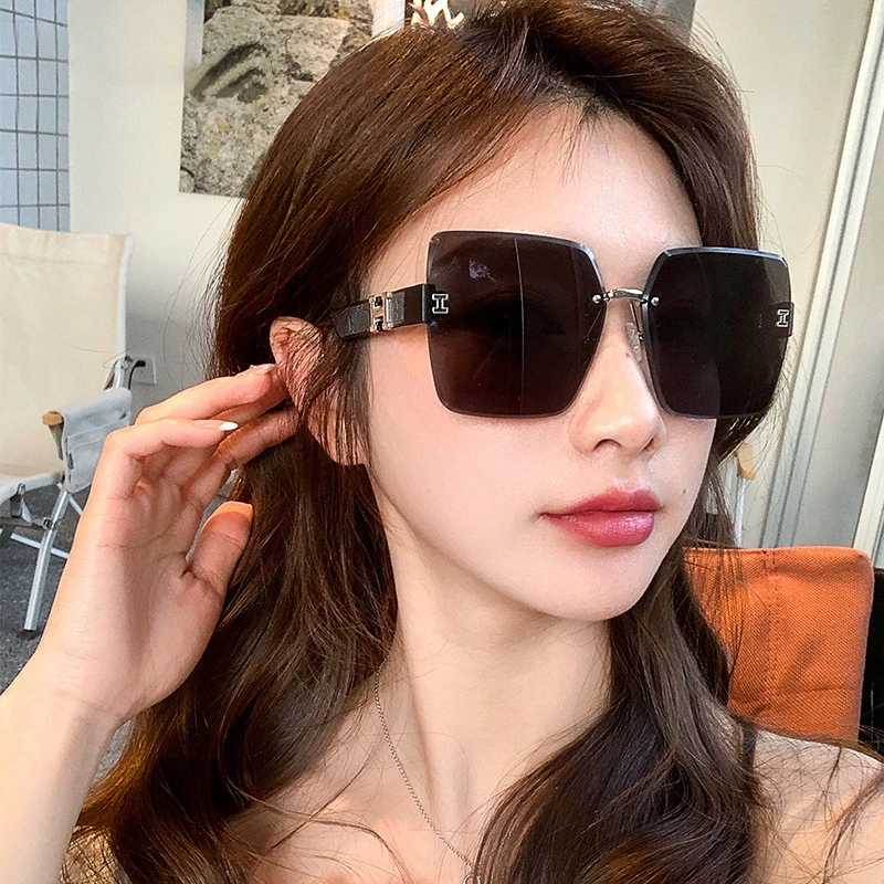 2023新款潮夏高级感无框墨镜女防紫外线大脸显瘦切边防晒太阳眼镜