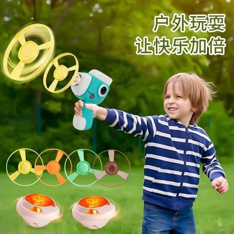 卡通恐龙飞行陀螺发光旋转发射竹蜻蜓弹射陀螺手枪飞盘带灯光功能