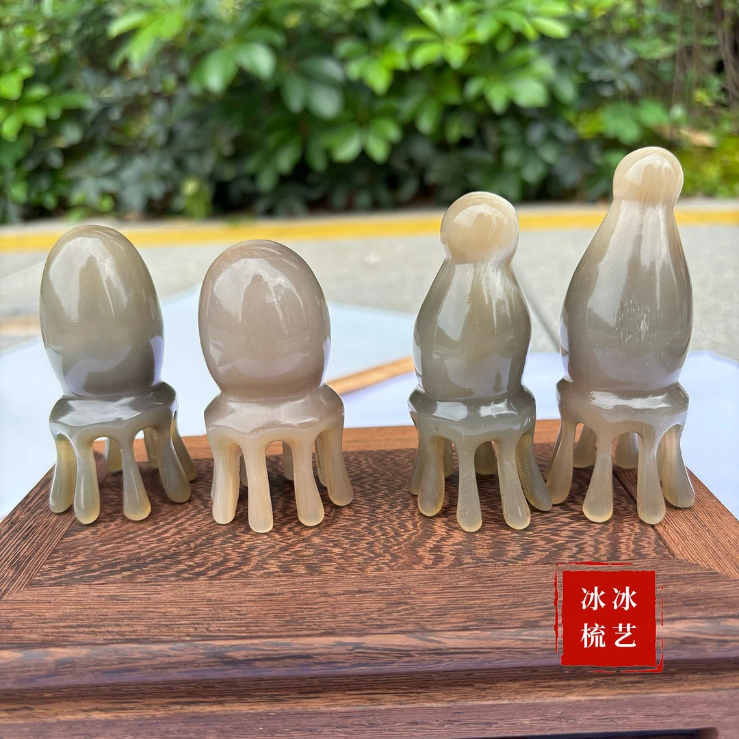 白牛角八爪鱼按摩梳头皮章鱼头疗按摩器头部经络穴位按摩梳疏通