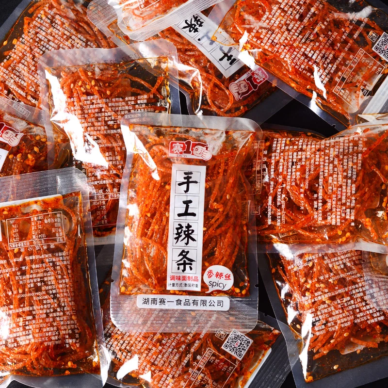 赛1网红香辣丝手工辣条散装独立小包装组合儿时怀旧零食大礼包