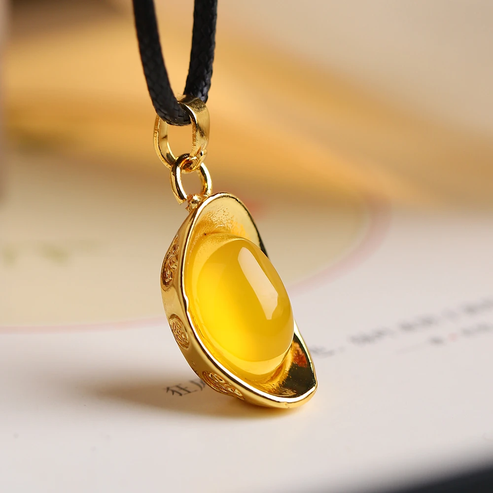 【柏娅专属】鸡油黄玛瑙合金镶嵌元宝吊坠HHBY012001