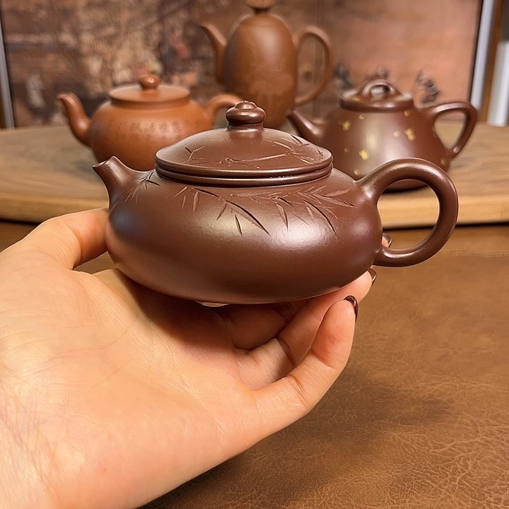 紫砂茶壶寒江刻绘