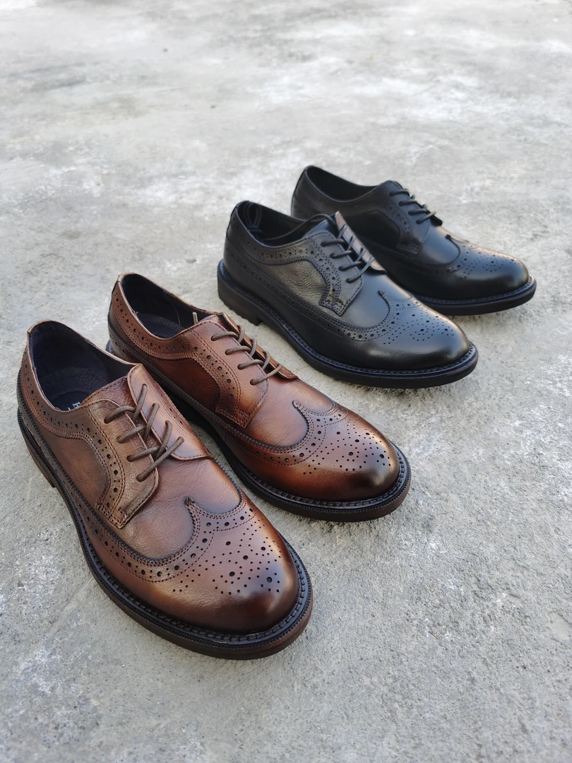 新款休闲鞋头层牛皮