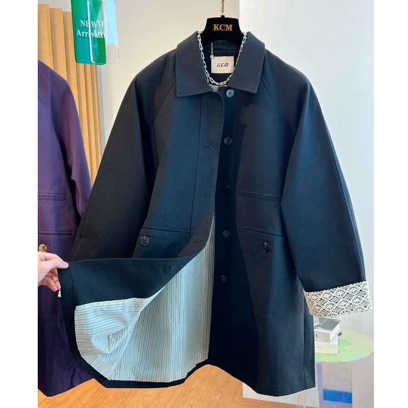 2024秋新款欧洲站蕾丝拼接袖口黑色翻领风衣女外套中长款宽松洋气