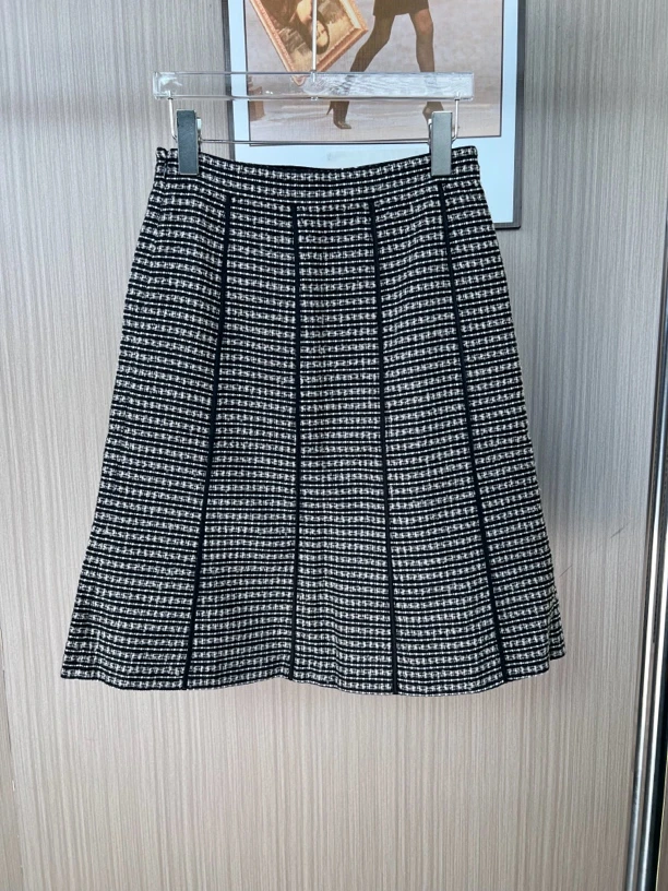 004品牌撤柜女装曼家时尚设计款小香风半身裙