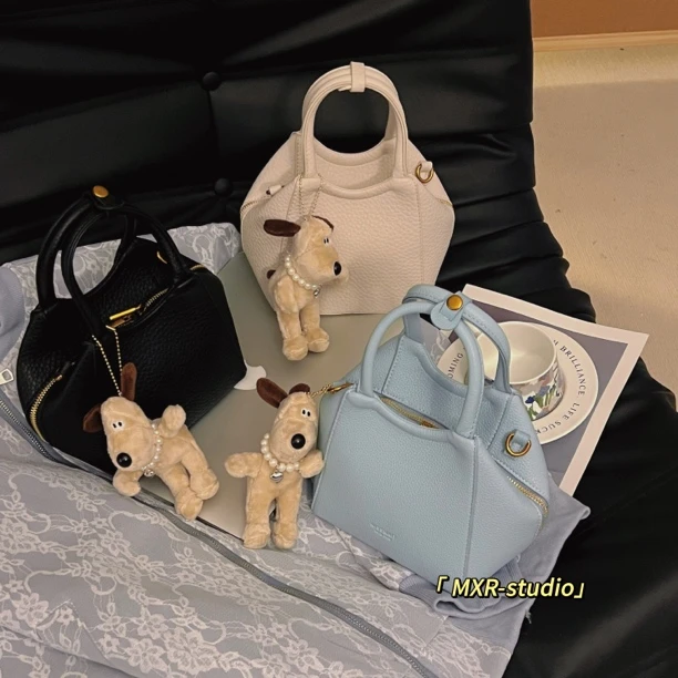 【夏日普吉岛】2024ins超火奶油色手提包水桶包包通勤女包时尚百搭