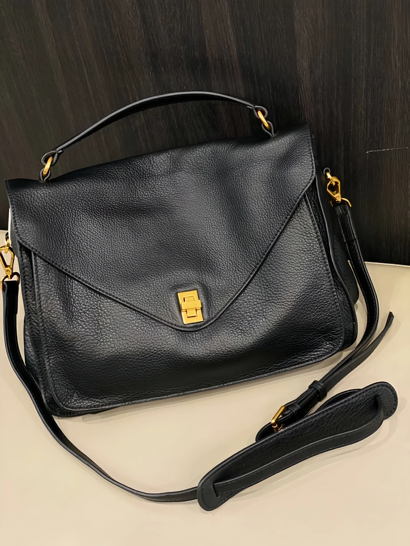 头层牛皮高档黑色正品韩版邮差包时尚真皮斜挎包复古休闲包31515