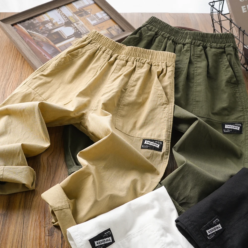 儿童男童夏季新款字母贴标拼接凉感休闲长裤中大童裤子S645