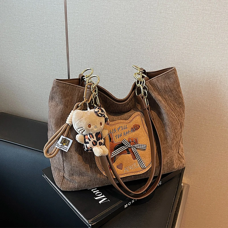 简约包包女2024新款潮流时尚百搭小众可爱挂件休闲质感单肩托特包