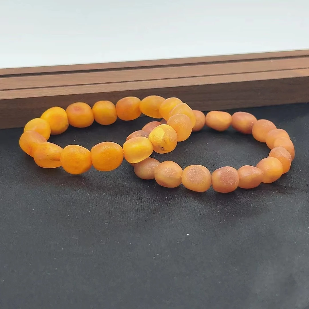 天然俄料鸡油黄蜜蜡手串 M627—多样性发