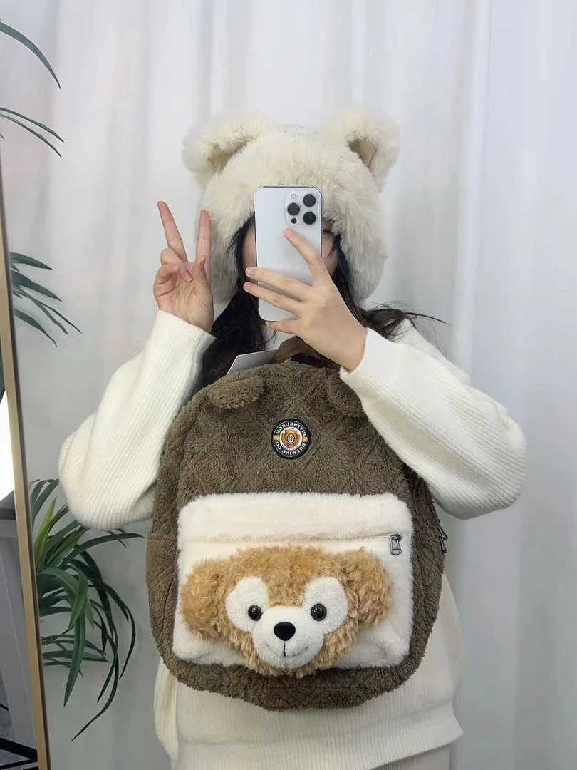 2023秋冬新款美拉德达菲熊水桶少女心可爱毛绒书包双肩包女
