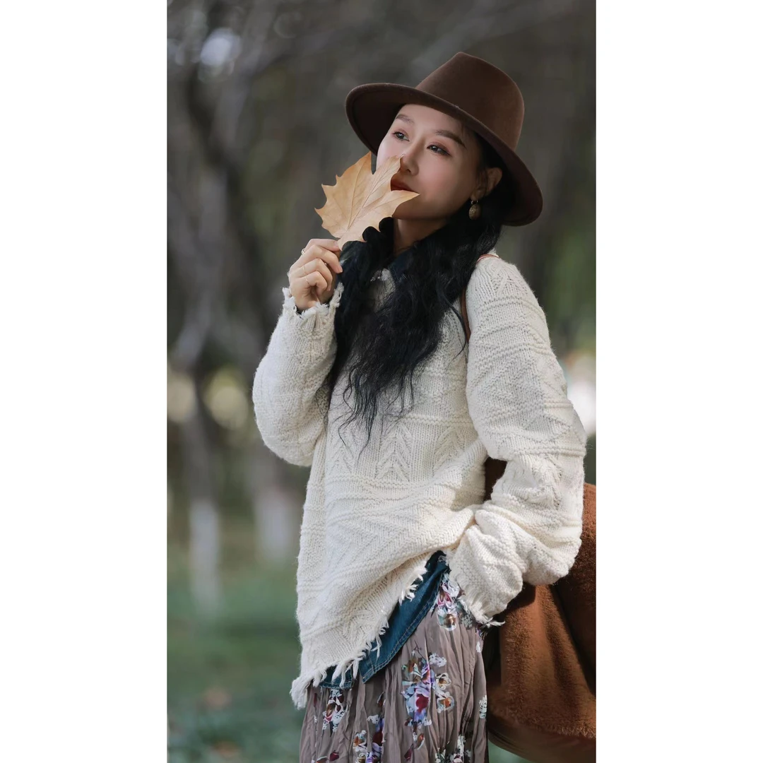 慵懒气质休闲小众破洞毛边流苏毛衣女