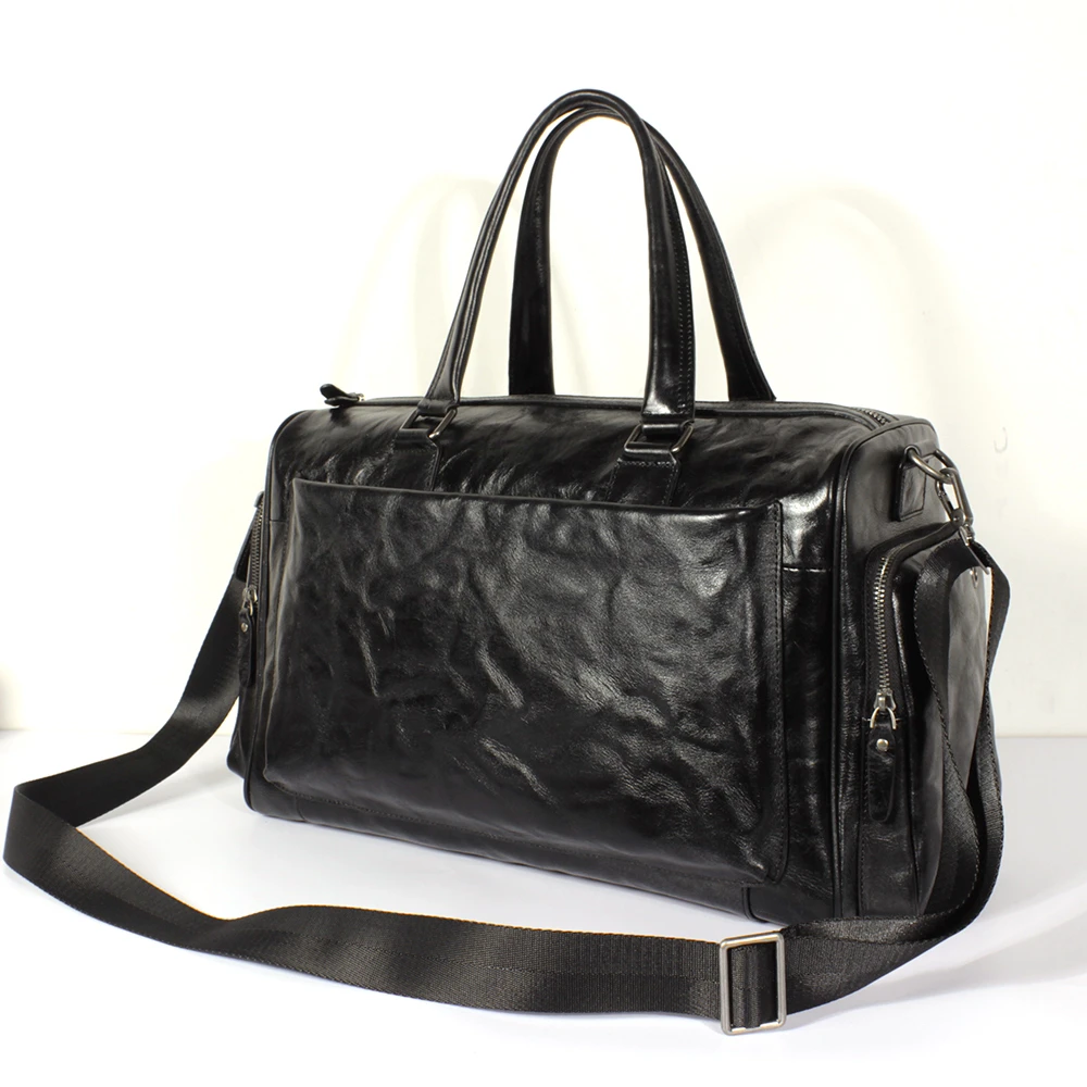 男士新托特旅行包手抓纹牛皮黑色，尺寸长44高27宽17。  9718旅行包