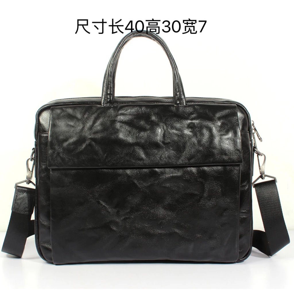 男士手抓纹牛皮黑色手提公文包尺寸长40高30宽7。   n3025