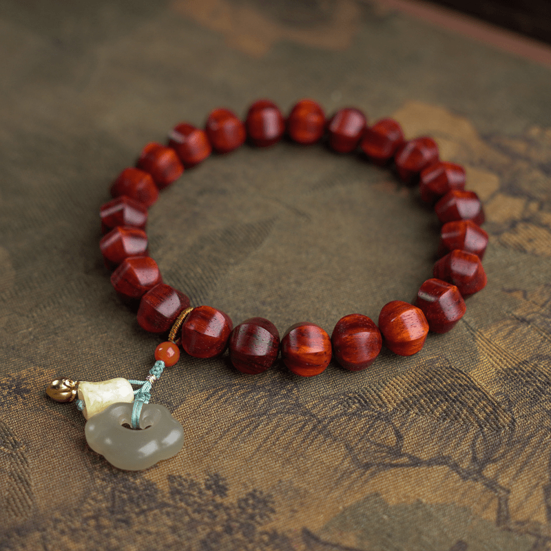 守道印度小叶紫檀灯笼珠手串 SDFXYZT0395XZBGZ