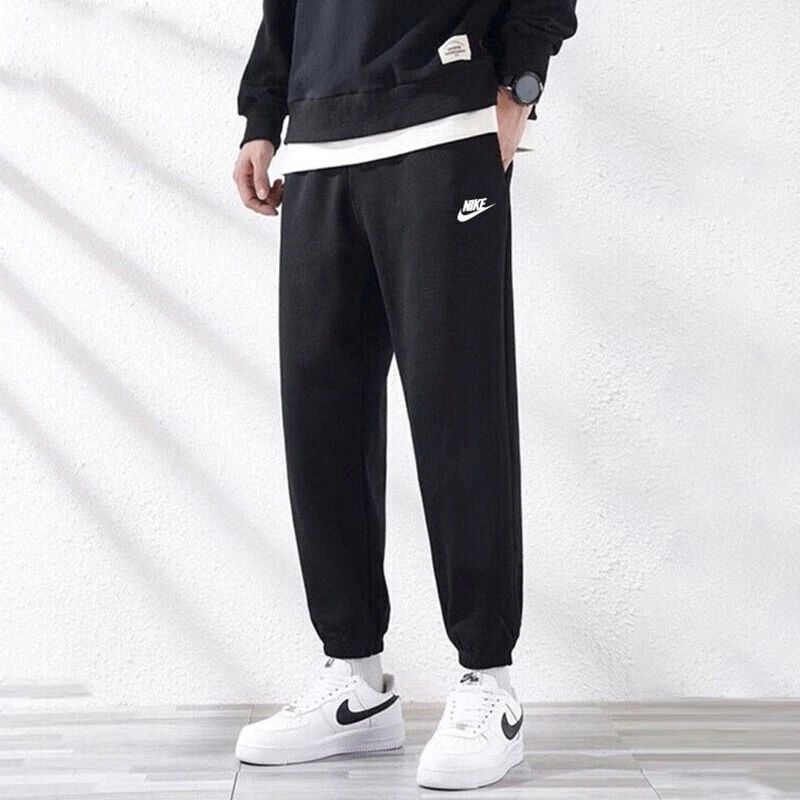 Nike耐克男裤春季新款宽松卫裤休闲舒适运动裤束脚长裤BV2738-010