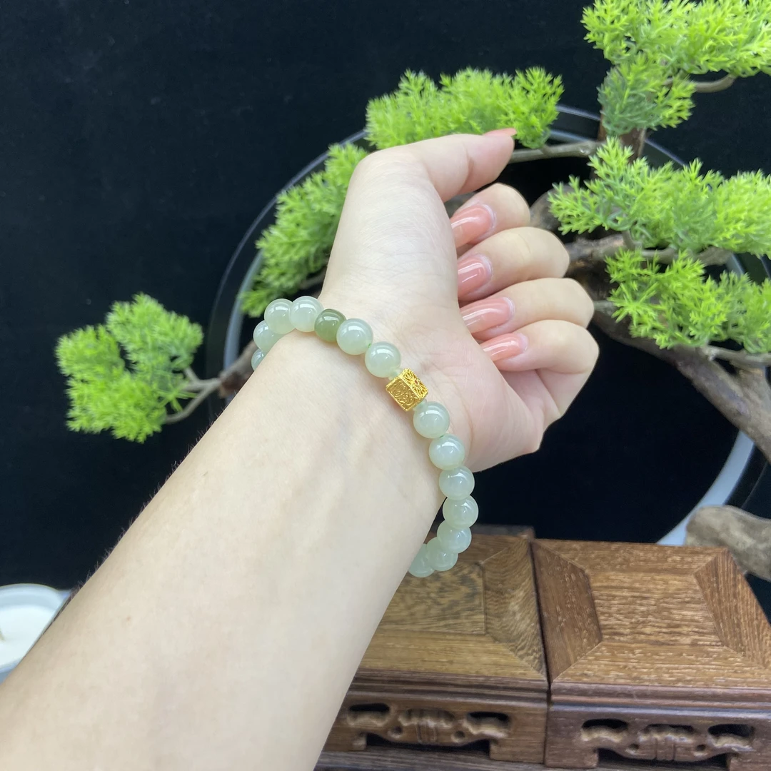 单圈和田玉搭配18K金扎基拉姆配饰手串D317869