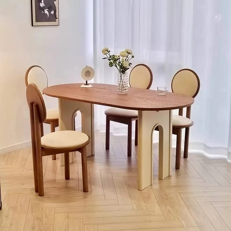 法式中古奶油风全实木椭圆形餐桌椅组合家用简约北欧侘寂风饭桌子