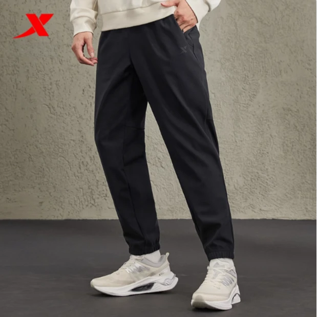 特步加绒男运动裤冬季新款训练针织长裤直筒男裤977429630390