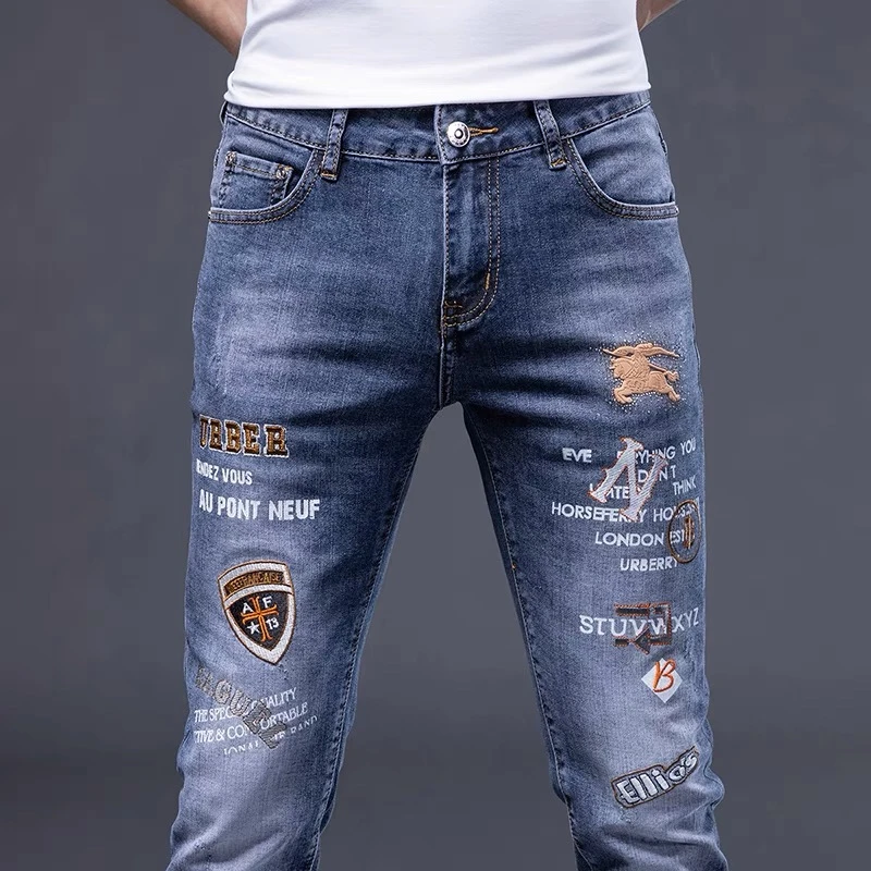 2025年新款男士刺绣弹力小脚牛仔裤男印花潮牌长裤子韩版百搭男装