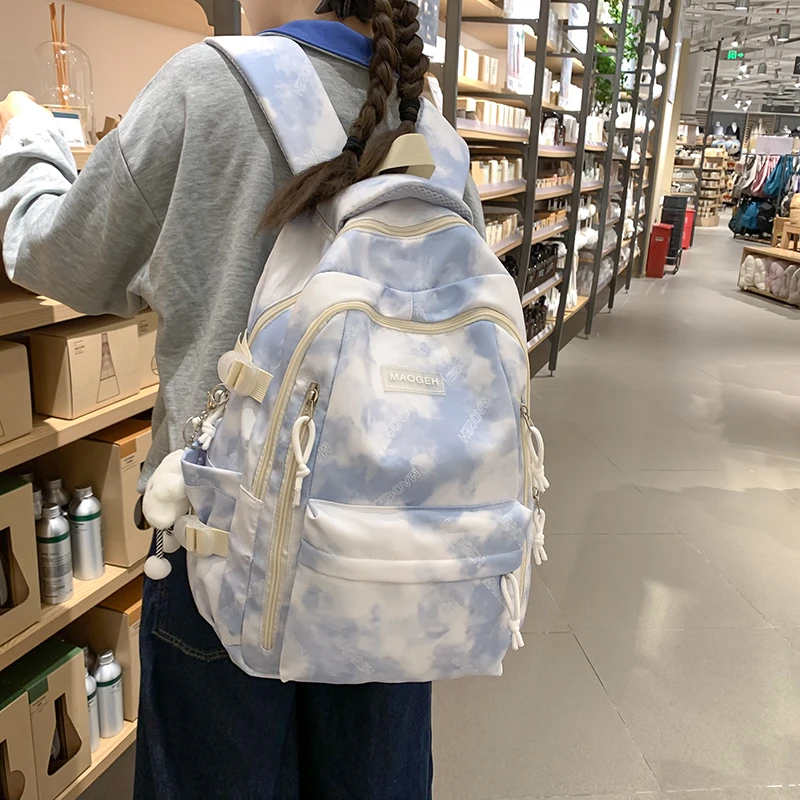 书包女生高颜値ins小众设计扎染双肩包中学生减负大学生电脑背包