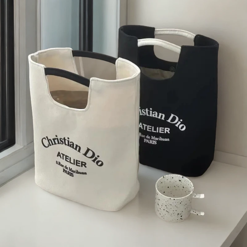 帆布水桶包上班族便携手提袋可爱水桶型手拎宝妈外出便当包手提包