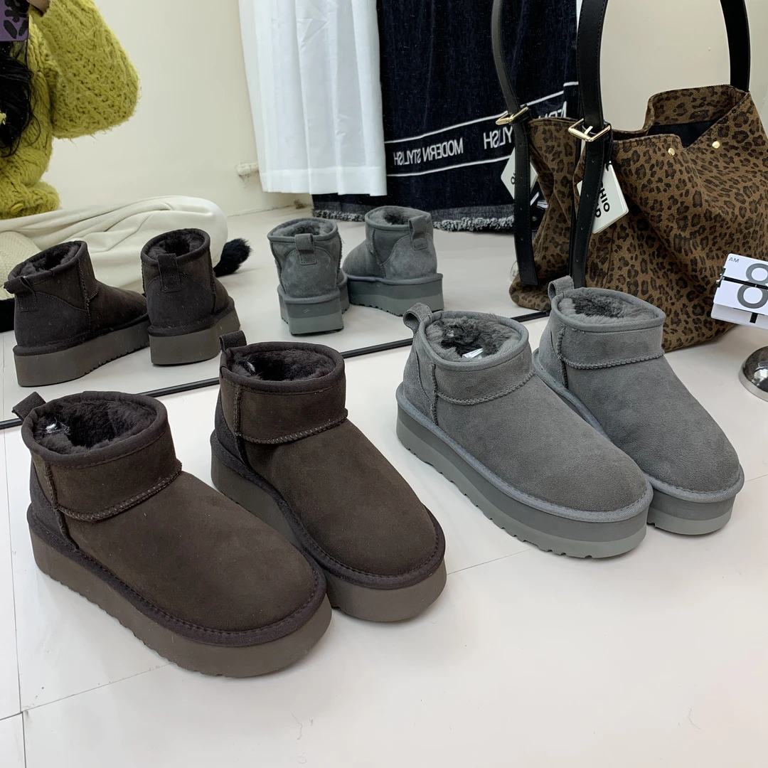 2025冬季新款周冬雨厚底雪地靴女羊皮毛一体短筒加绒保暖防水增高