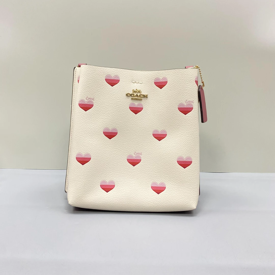 99新 COACH/蔻驰 小林Mollie白色爱心小水桶包20*21*10cm Z110704