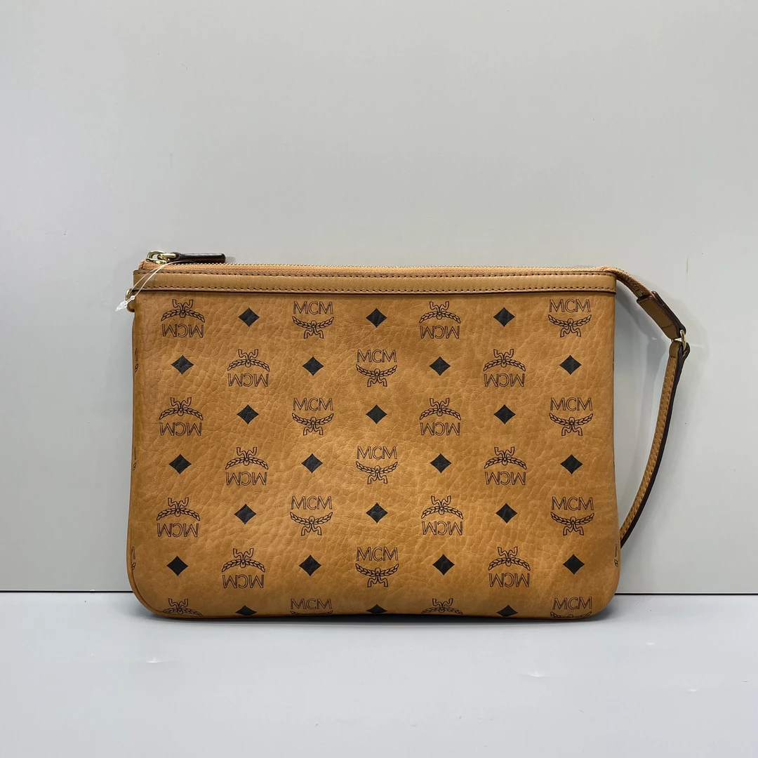 95新 MCM 媚姐/mcm干邑色手拿腋下包29*21*1cmF112753