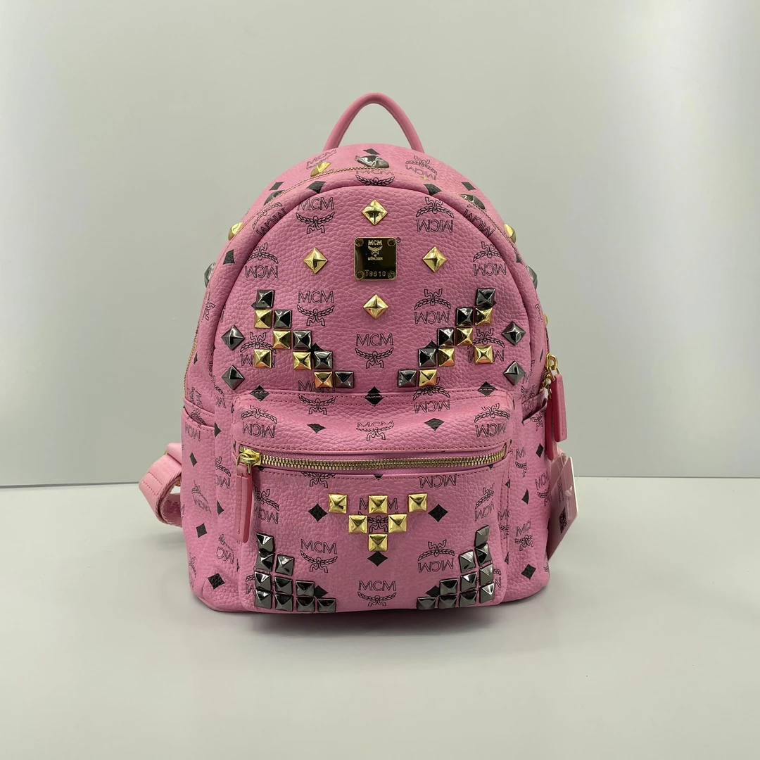 90新 MCM 媚姐/mcm粉色铆钉中号双肩包26*32*13cmF121002