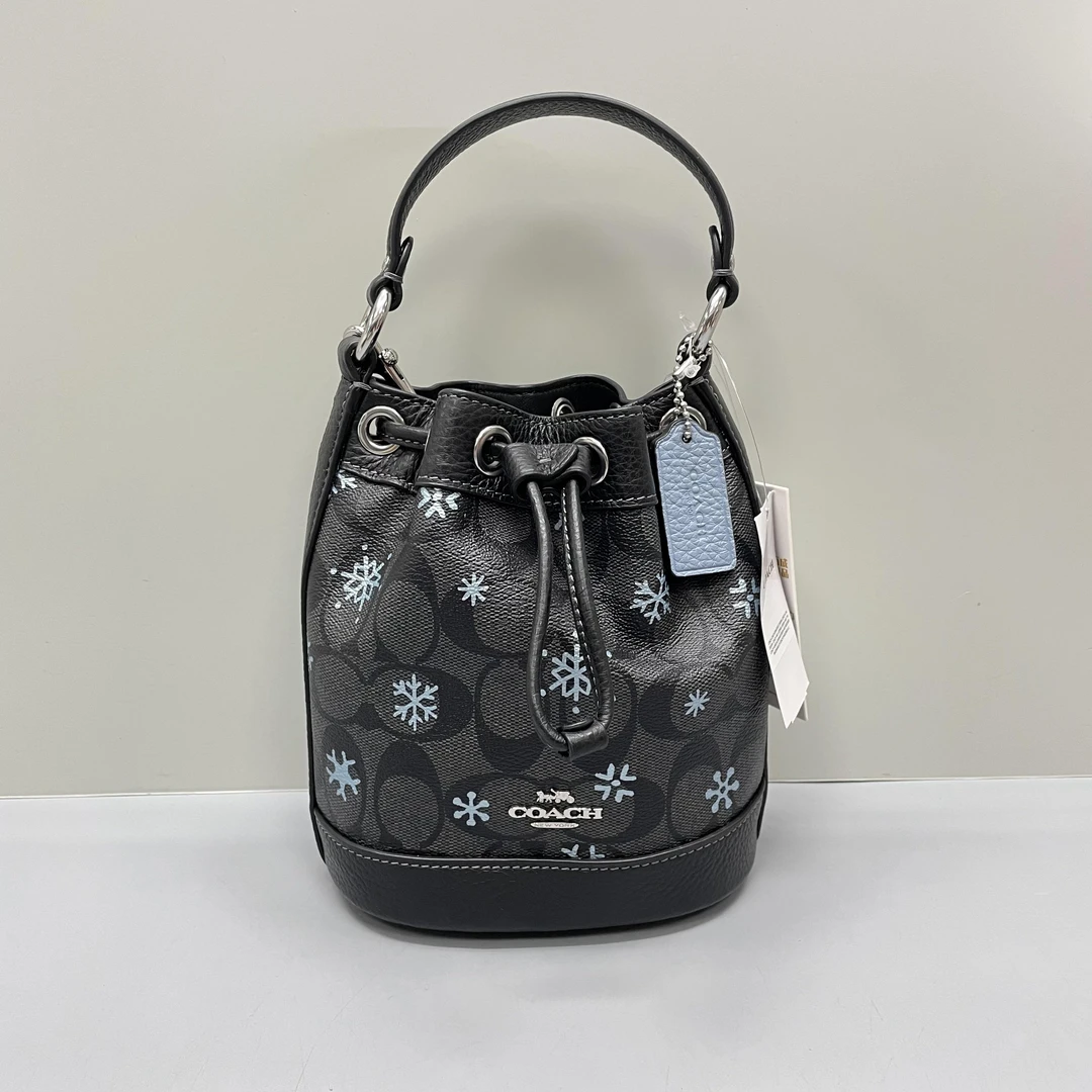 99新 COACH/蔻驰 黑拼老花雪花抽绳迷你水桶包15X17X9cmL021610
