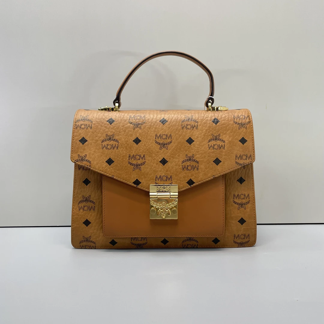 90新 MCM mcm干邑色大手提邮差包27x21x9cmL101034