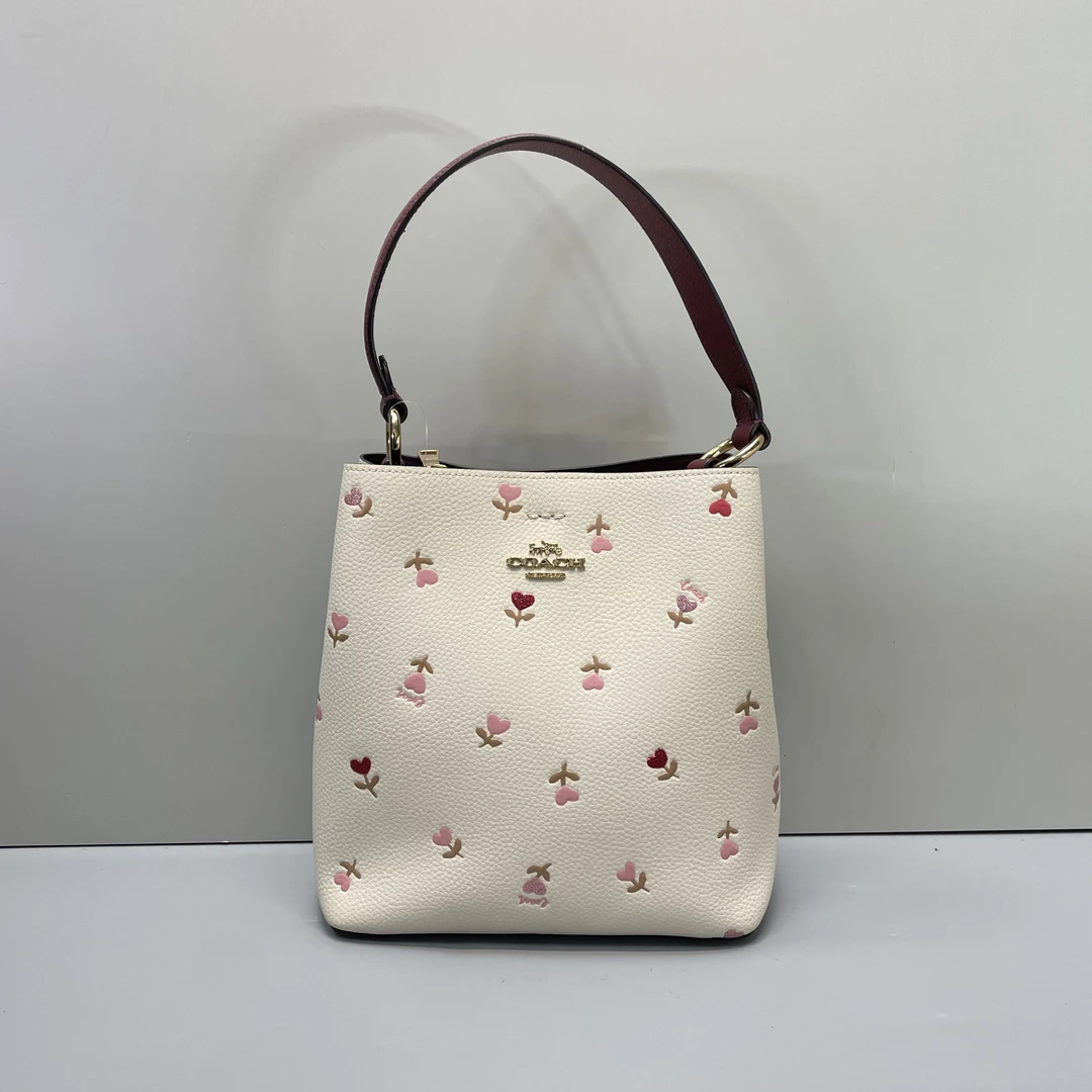 95新 COACH/蔻驰 town爱心花朵白色小号水桶包20x22x10cmL112103