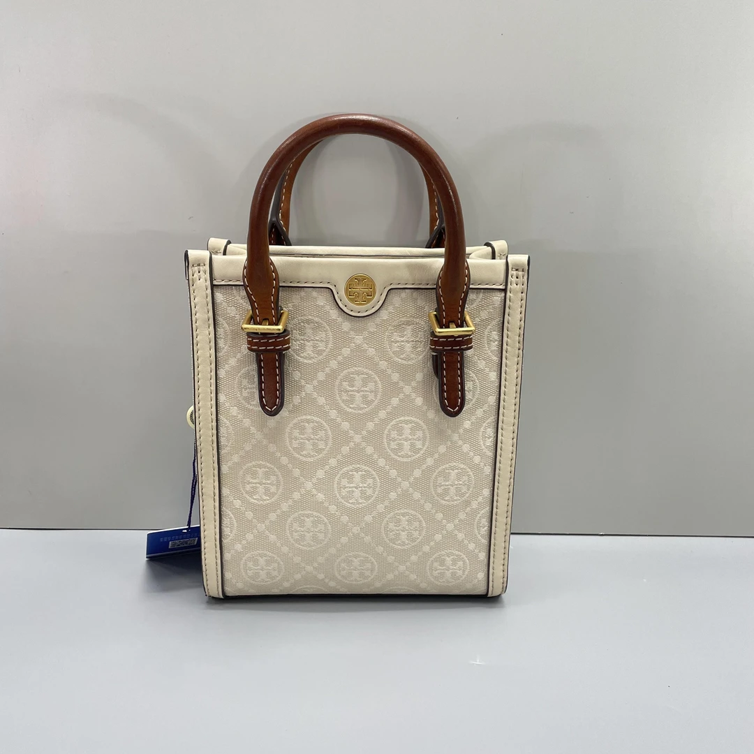 95新 TORY BURCH/汤丽柏琦 棕拼白色老花琴谱包16X19X5cmL052912