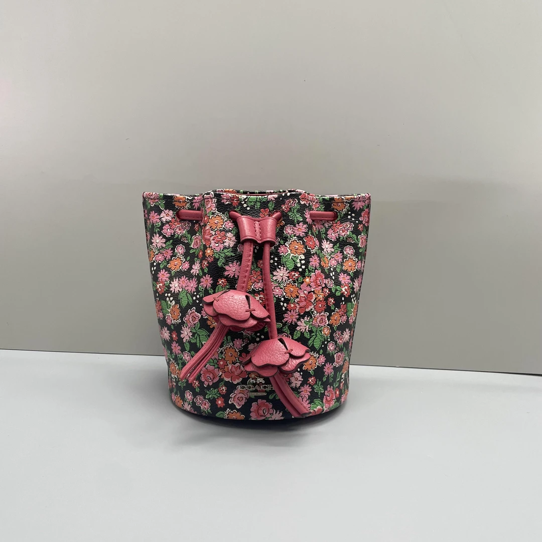 90新 COACH/蔻驰 小林/粉色花卉抽绳水桶包14*16*13cmA071512