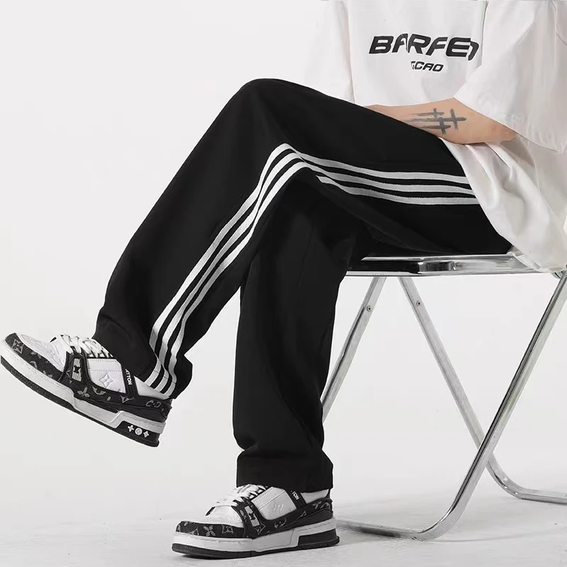 美式情侣休闲男生女生休闲长裤平脚高街潮流春秋三条杠裤子