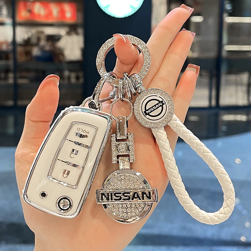 21款日产轩逸经典钥匙套女逍客蓝鸟劲客骐达钥匙包尼桑扣折叠钻壳