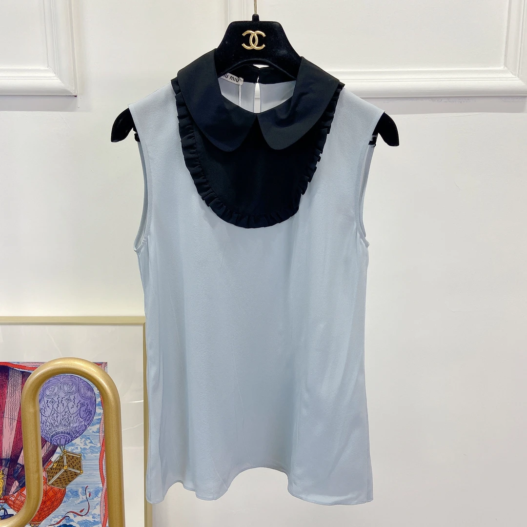 Miumiu 蓝色无袖上衣/市场价3500/95新/08160601/涵