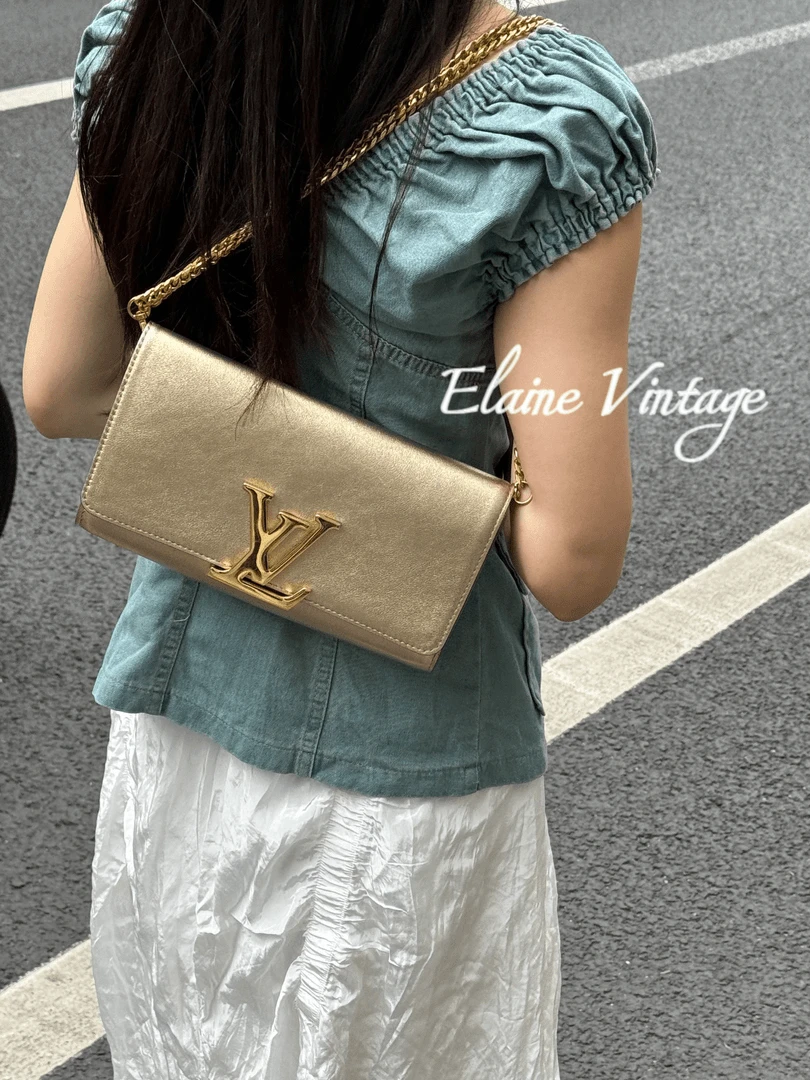 95新 LouisVuitton/路易威登 金色大logo手拿包