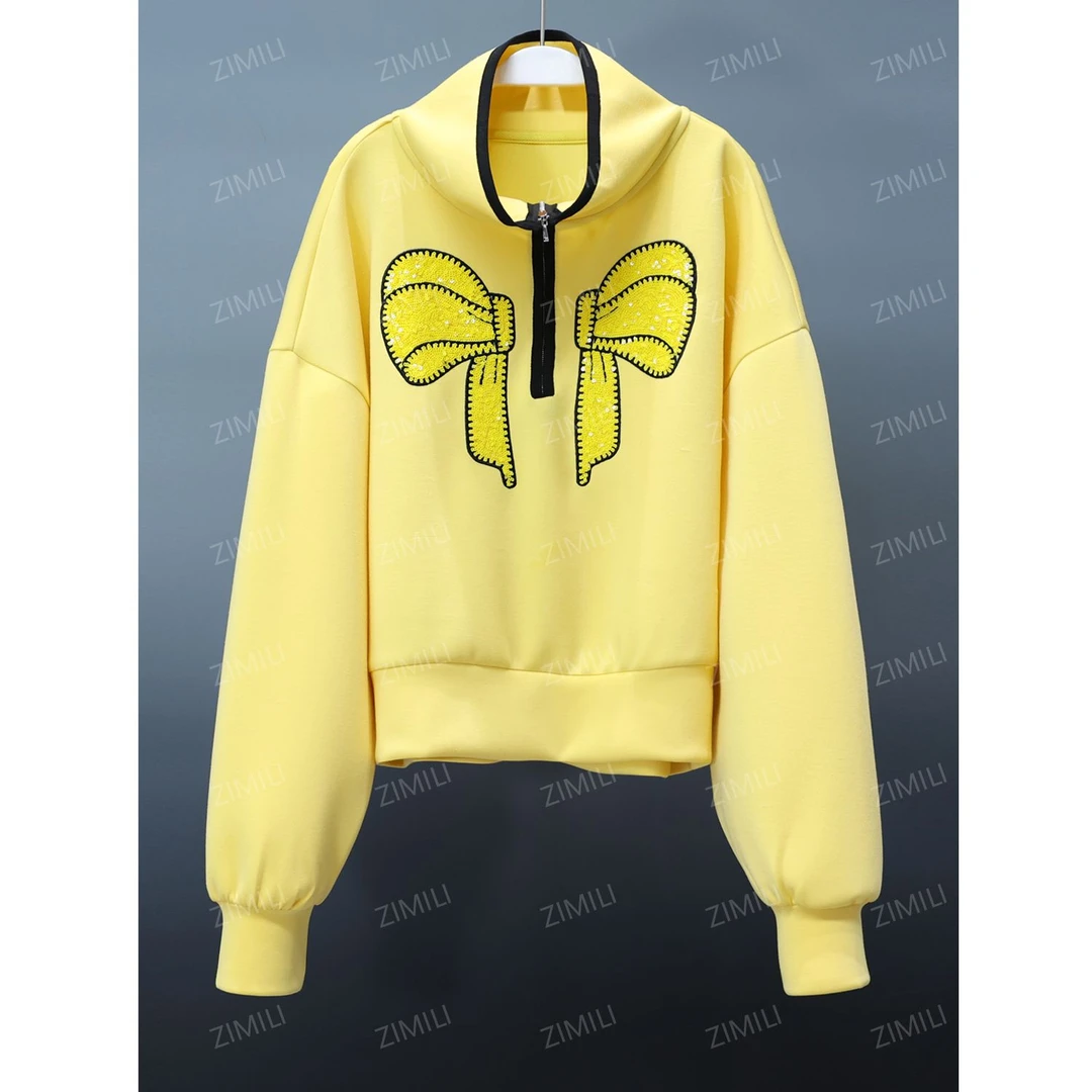 【韩哥女装】秋季精致感穿搭鹅黄色烫钻蝴蝶结潮流时尚立领卫衣2696