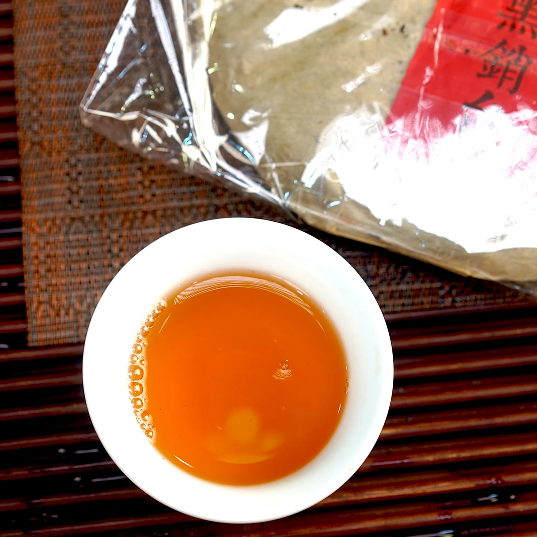 99年销苔生茶饼易武麻黑古树