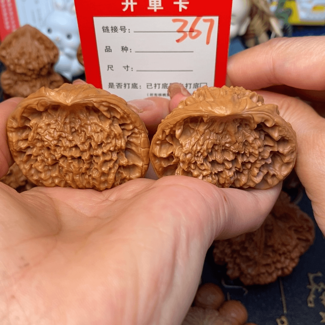 桃核吊坠文玩城的小