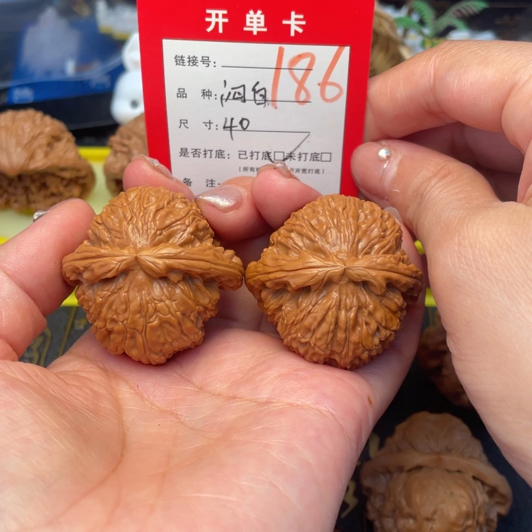 桃核吊坠文玩城的小