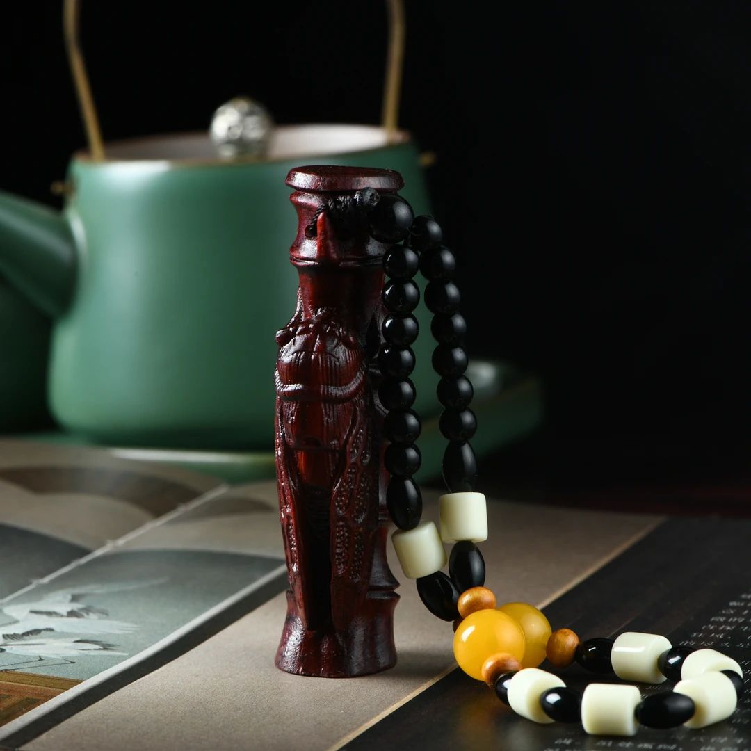 赞比亚血檀竹节知了手把件